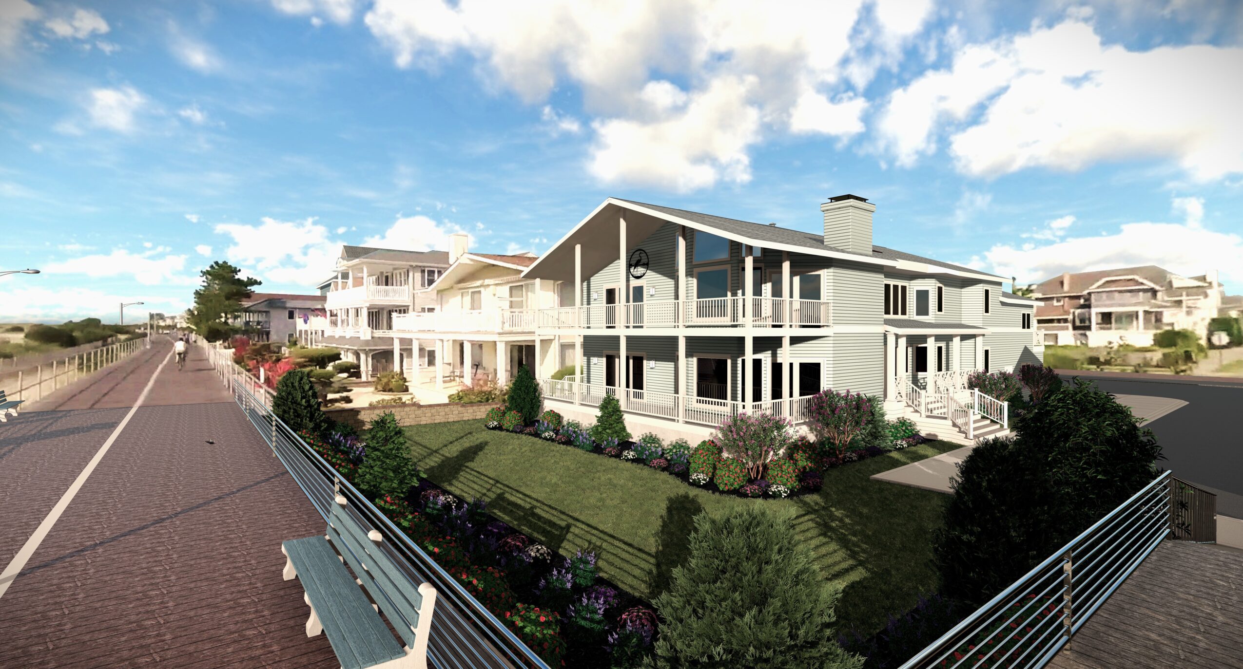 Modern multi-story house with large balconies, surrounded by a green lawn and bushes, under a partly cloudy sky.