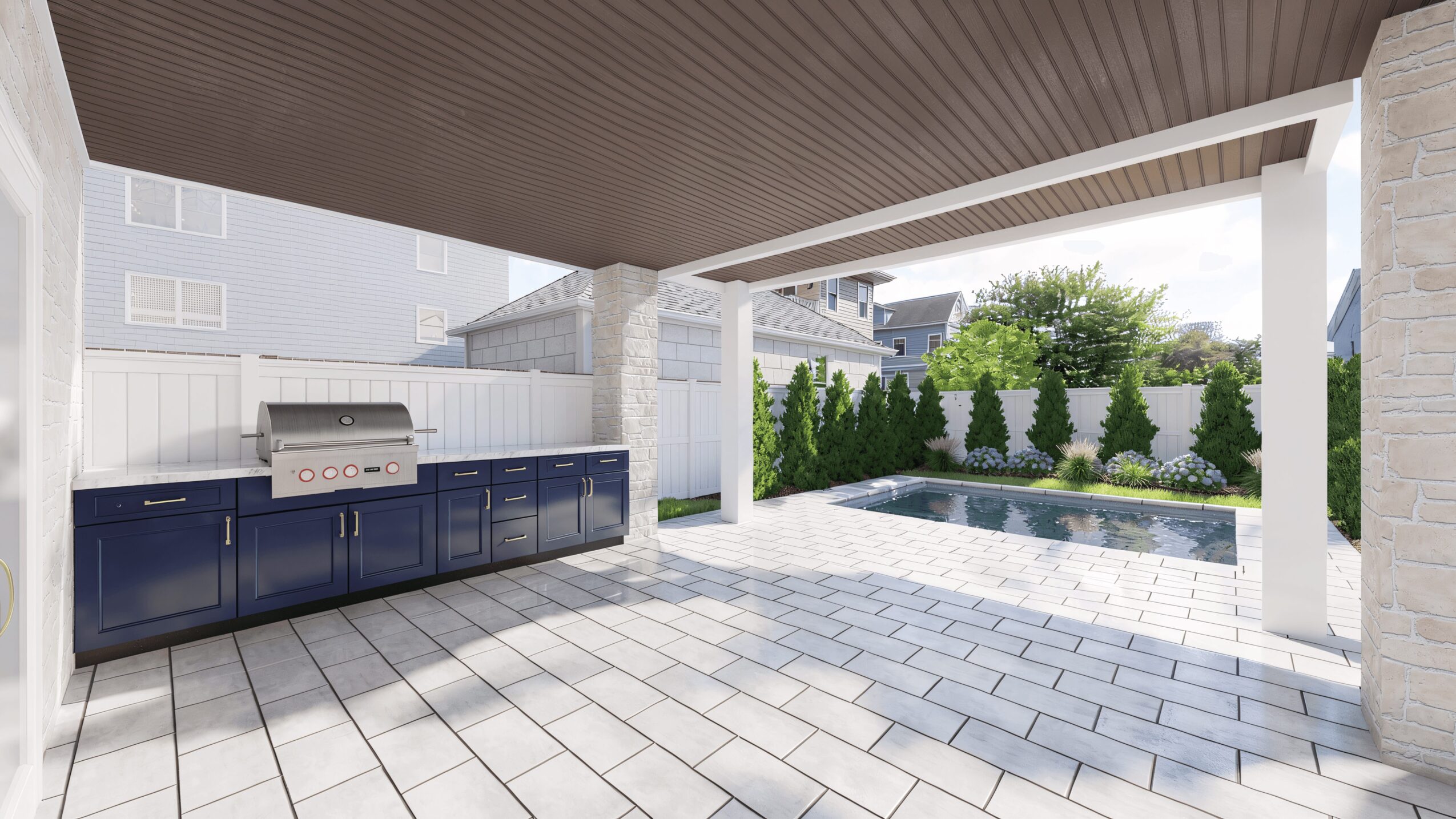 Outdoor patio with built-in grill, tiled floor, and a view of a backyard with a pool and greenery.