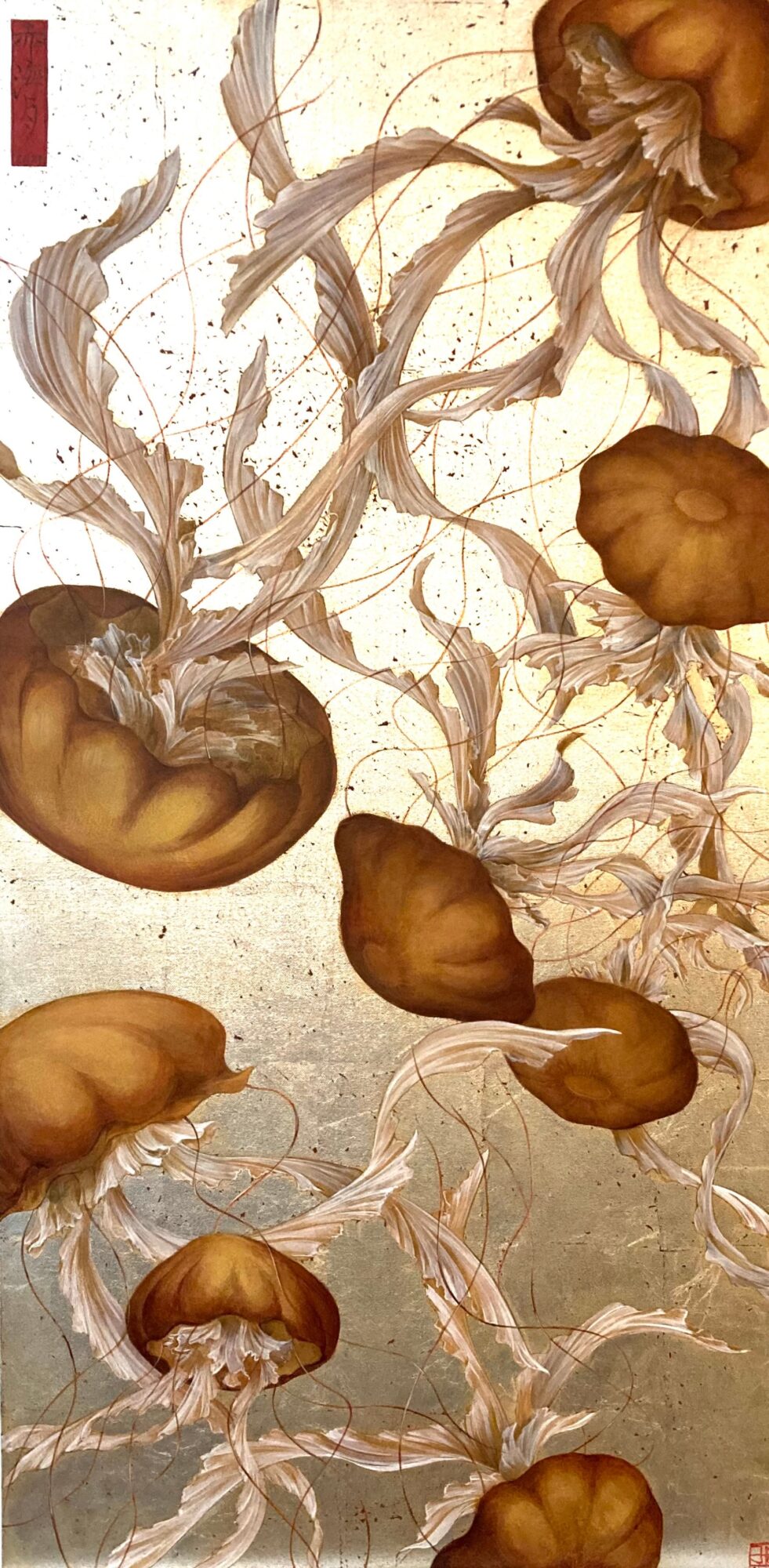 Jellyfish with long tentacles floating in water, various sizes and shades of brown, with a light background.
