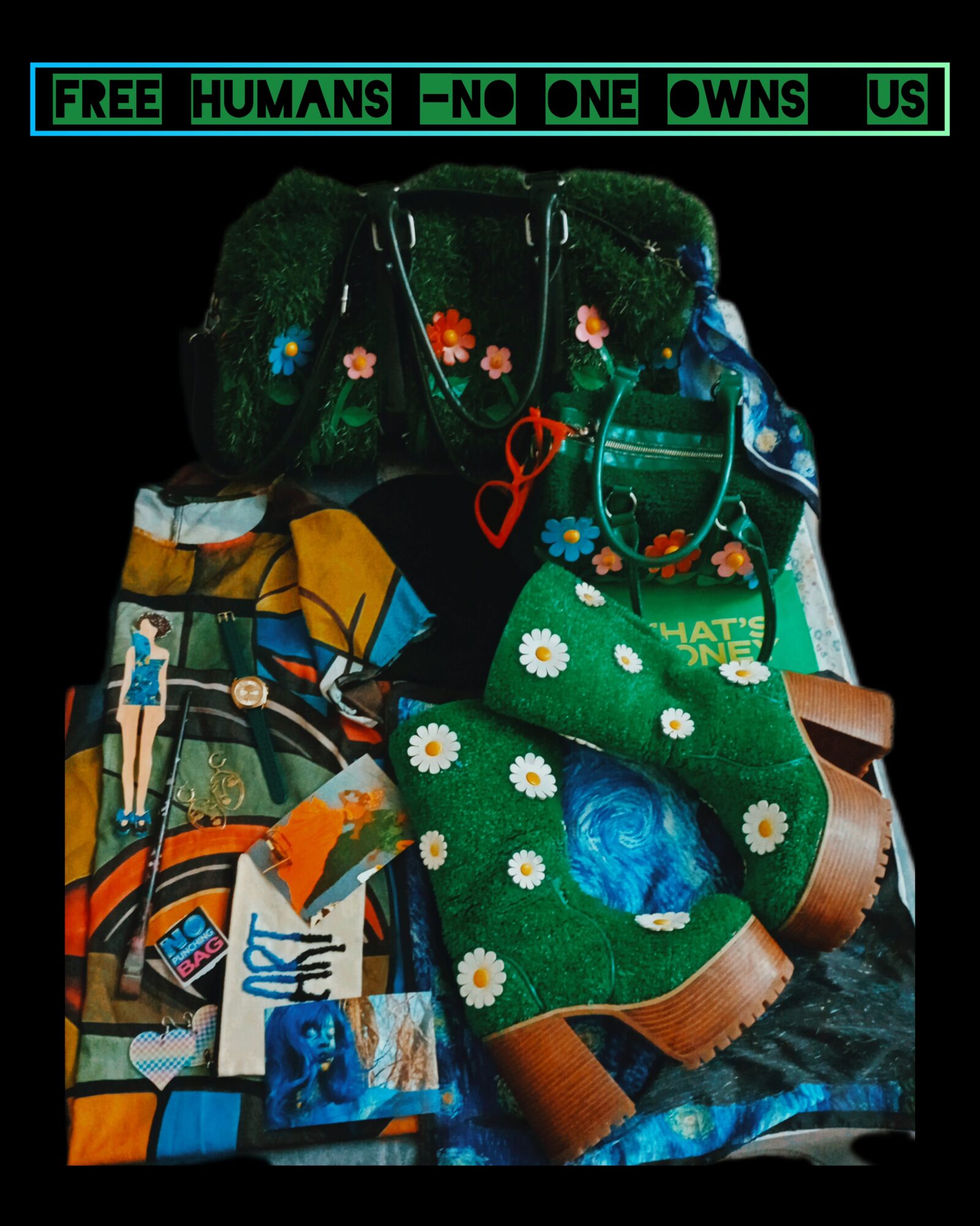 Collection of colorful bags, clothing, and accessories with floral and nature designs, and a sign reading 'FREE HUMANS -NO ONE OWNS US'.