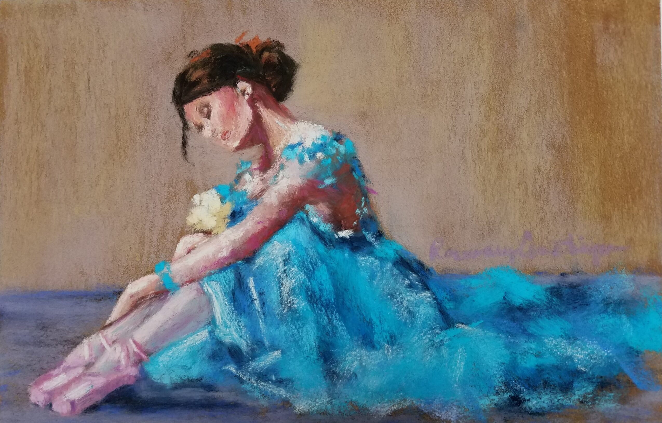 Young girl in a blue dress sitting on the floor, holding a doll, with a neutral background.