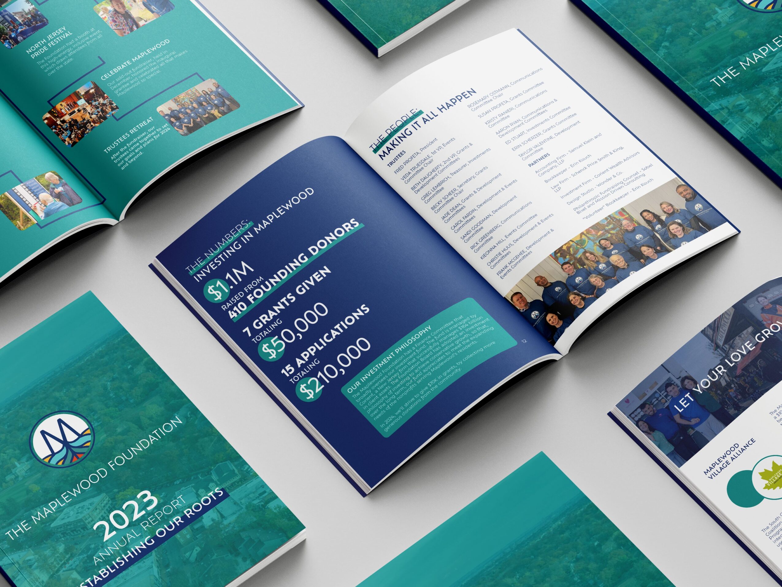 Open annual report with text and images, showing financial and donor information, on a white surface.
